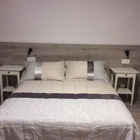 La Casa De Los Soportales Mansilla de las Mulas Buitenkant foto